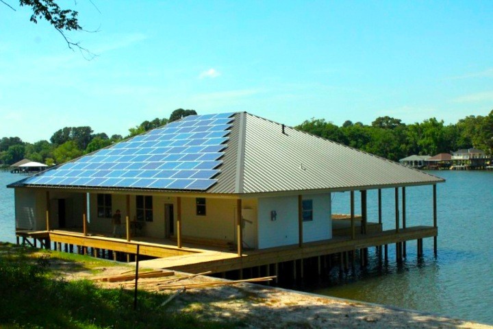 Solar panels installed on the roof of a boathouse delivers 18 kW of power.
