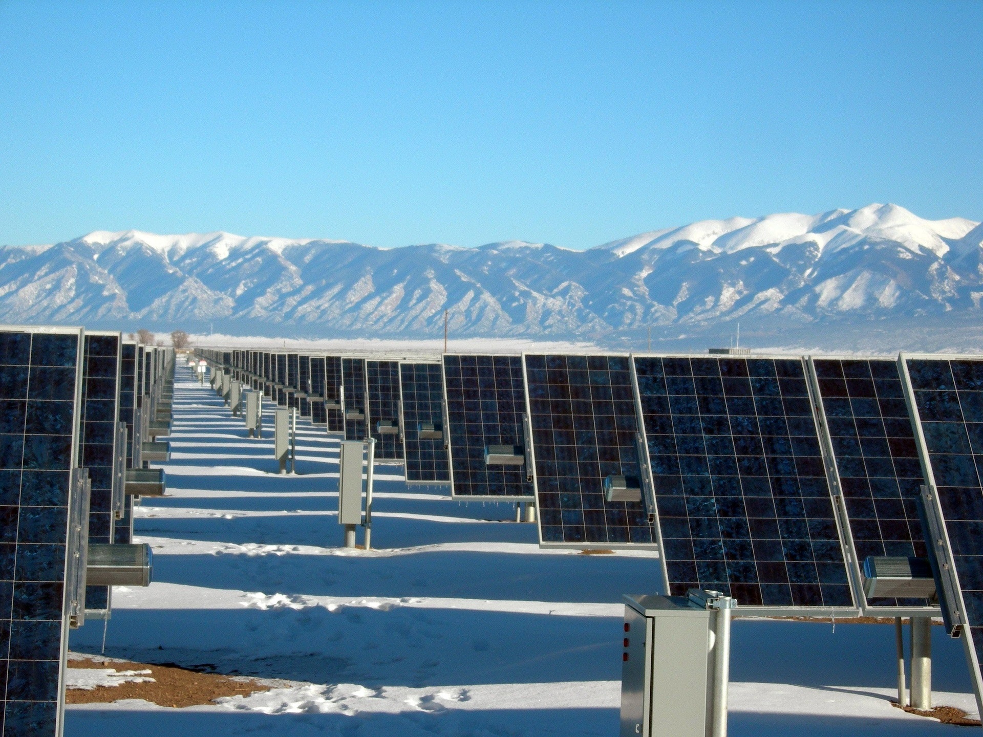solar panels snowy mountains